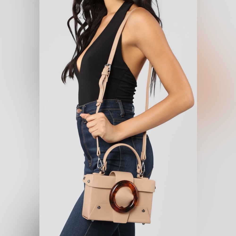 LIKE DREAMS Agatha mini vegan satchel. Large Tortoise Ring Studded Front Detail